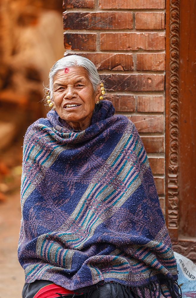 lady wrap shawl travel photography village elder orange